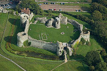 William ordered a Castle to built to protect his men from attack in the early stages of the Norman Invasion. Pevensey Castle was later built in stone, shown here.