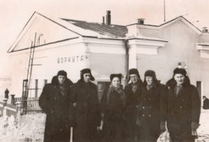 Latvia prisoners outside huts that they were allowed to build outside the fences of the main camp in 1955